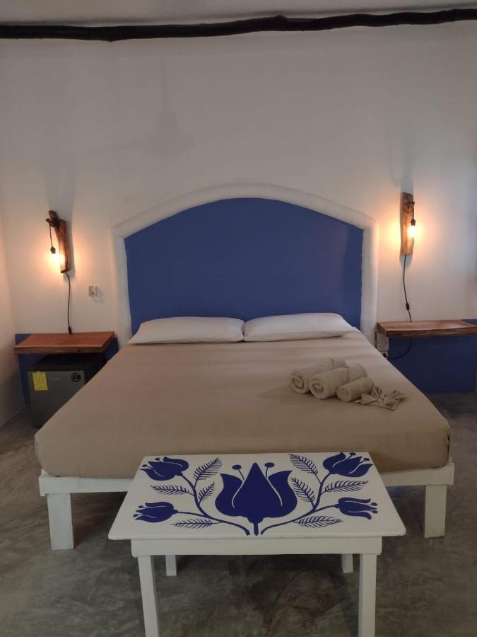 Mio Tulum Hotel Boutique Eksteriør billede A bedroom in a hotel