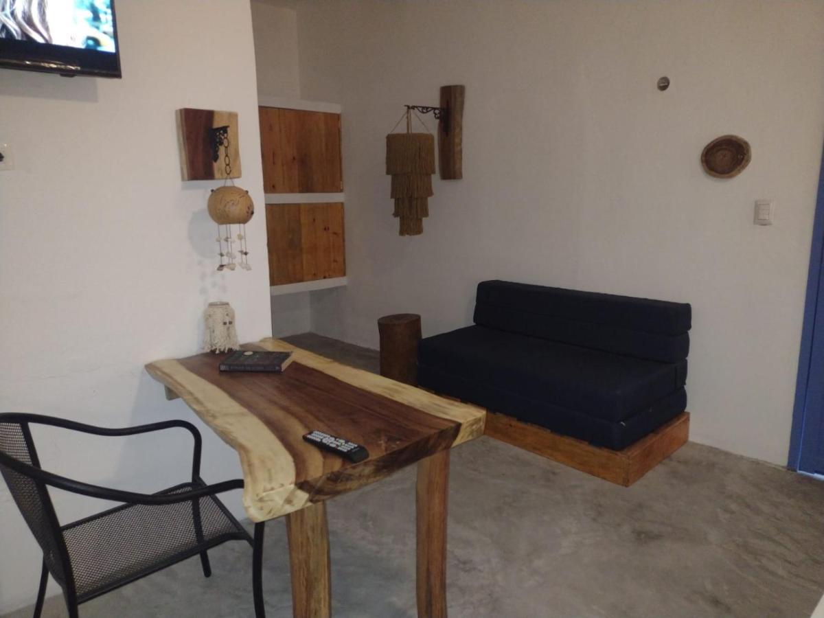 Mio Tulum Hotel Boutique Eksteriør billede A living room in a hotel in Greece